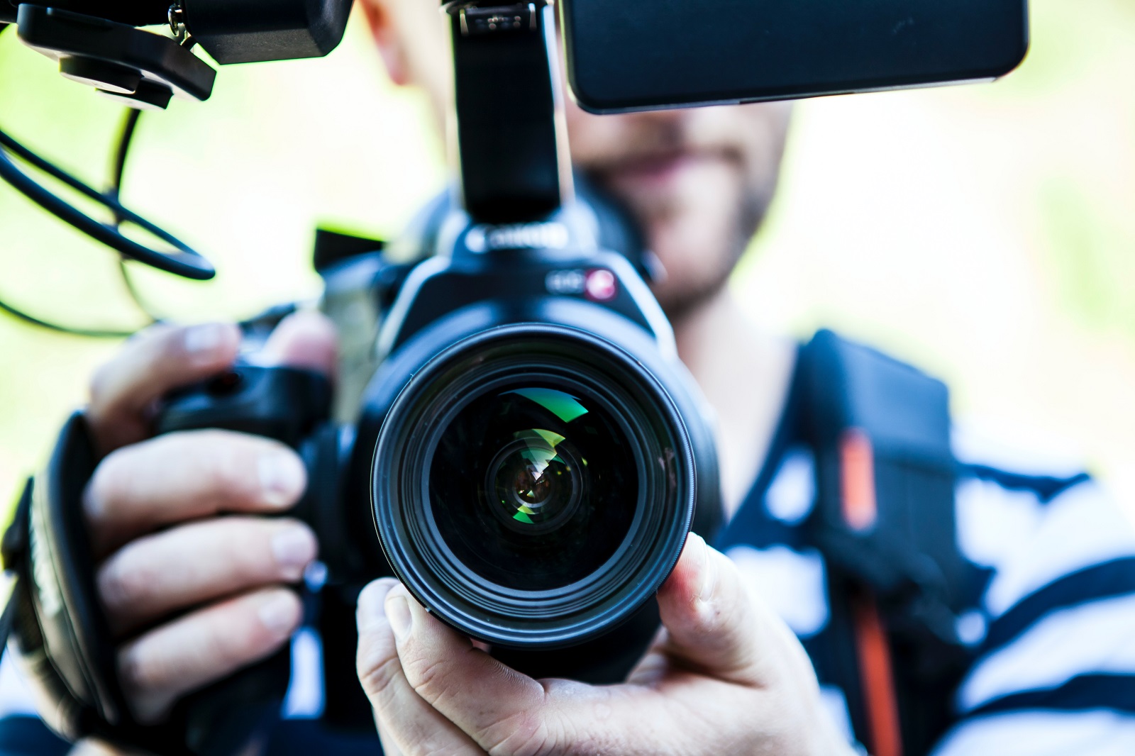 Camera operator filming a live broadcast